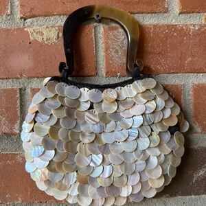 Elegant Shell-Embellished Handbag